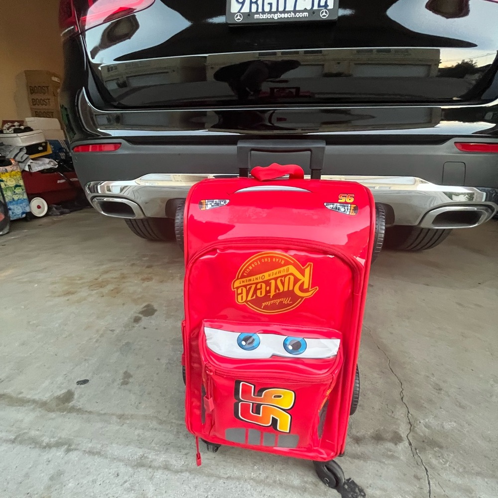Disney Cars child rolling luggage